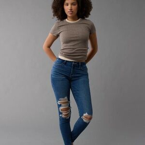 AE NEXT LEVEL RIPPED HIGH WAISTED JEGGING